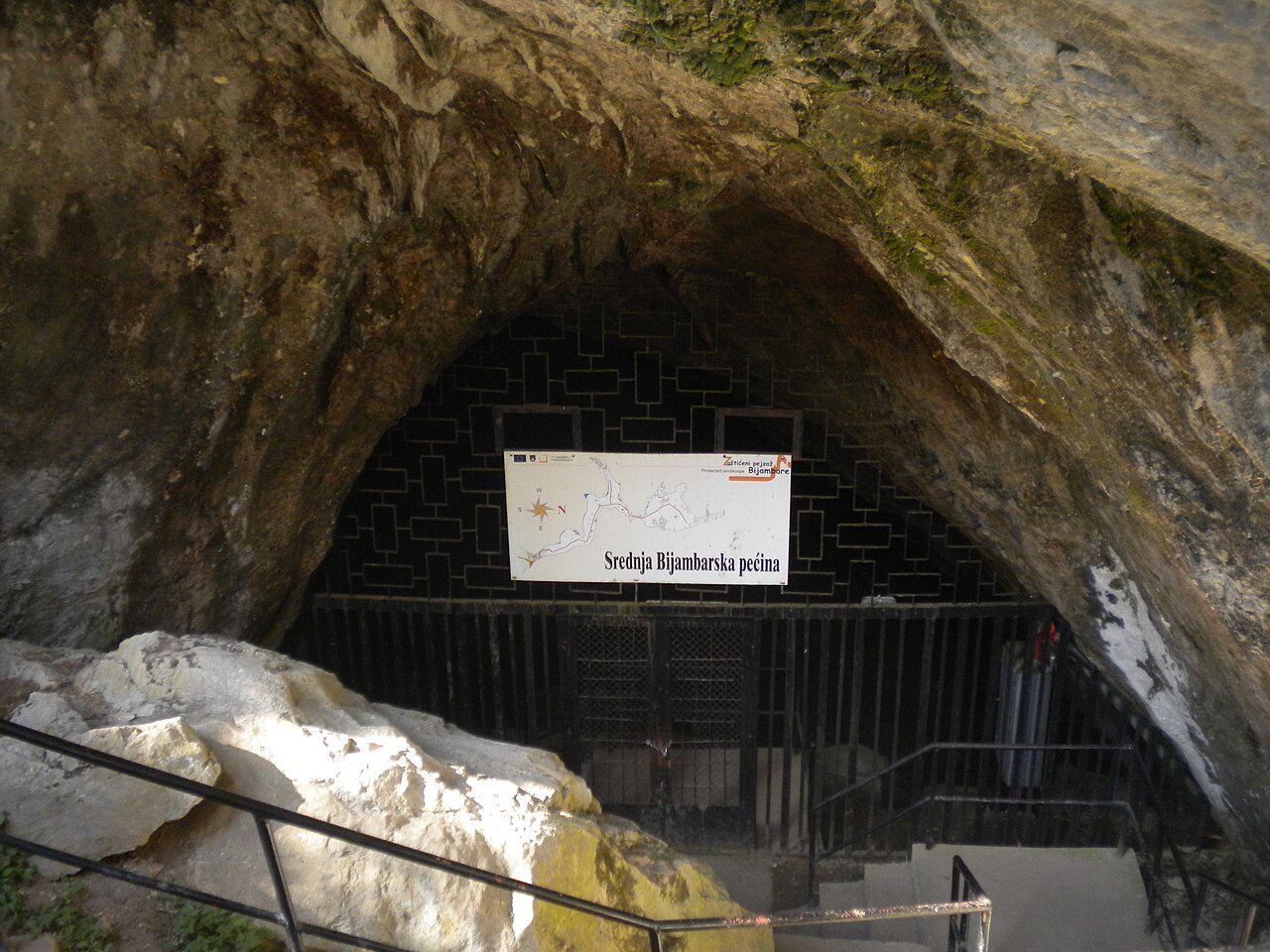 The entrance of the middle cave at Bijambare, with a walkway leading inside