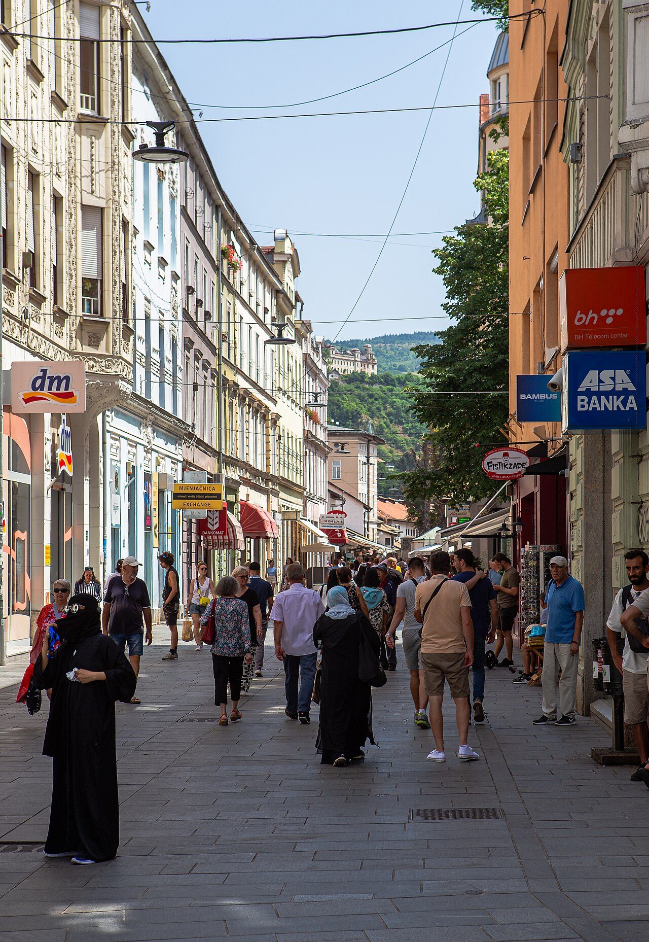 People walking along Ferhadija, the pedestrian street through central Sarajevo