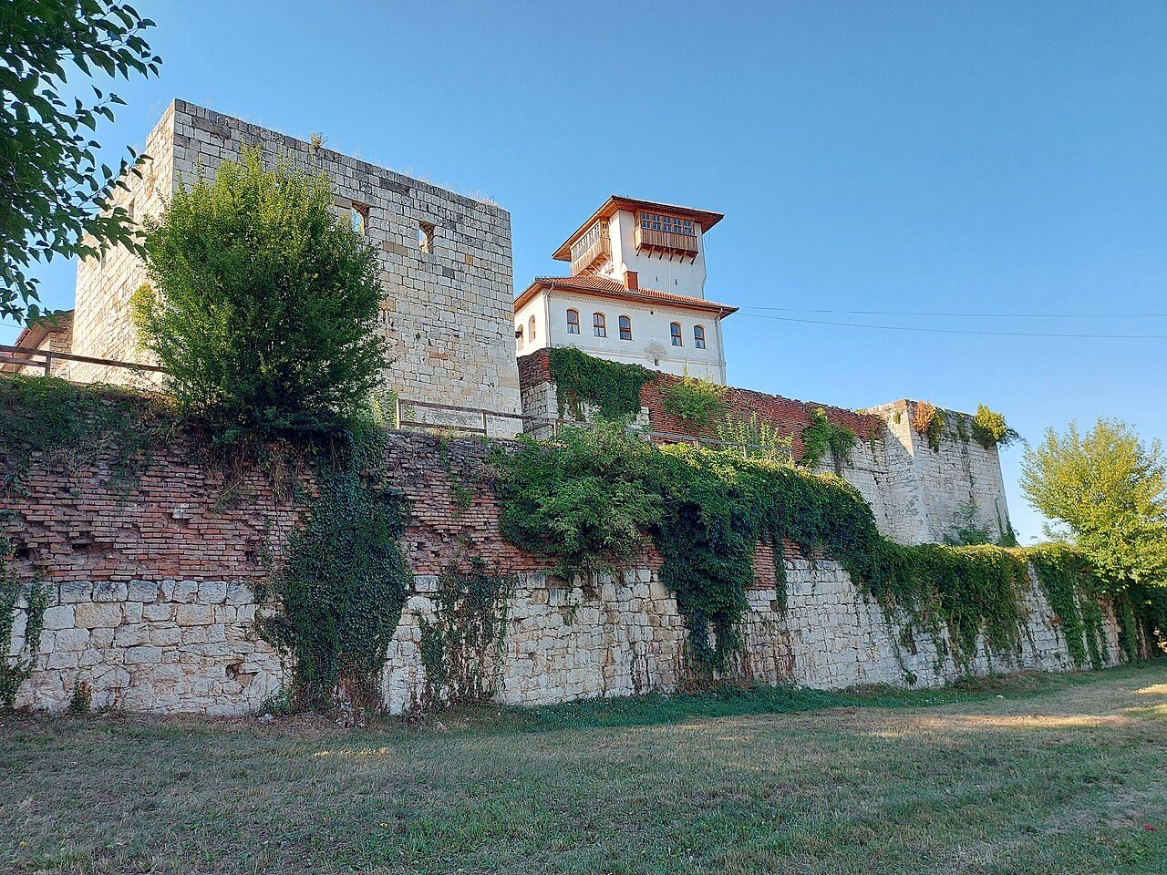 The walls of Gradačac Fortress and the white Husein-kapetan Gradaščević tower