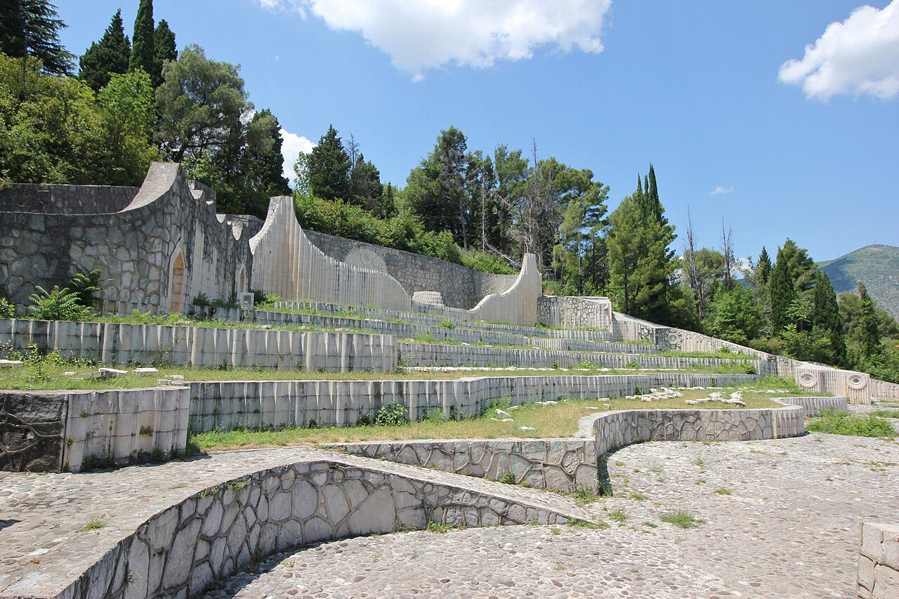 The stone terraces and curving walls of the Partisan Memorial Cemetery in Mostar