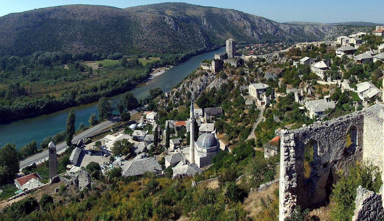 Počitelj from above: stone houses, the mosque and the fortress walls over the Neretva valley