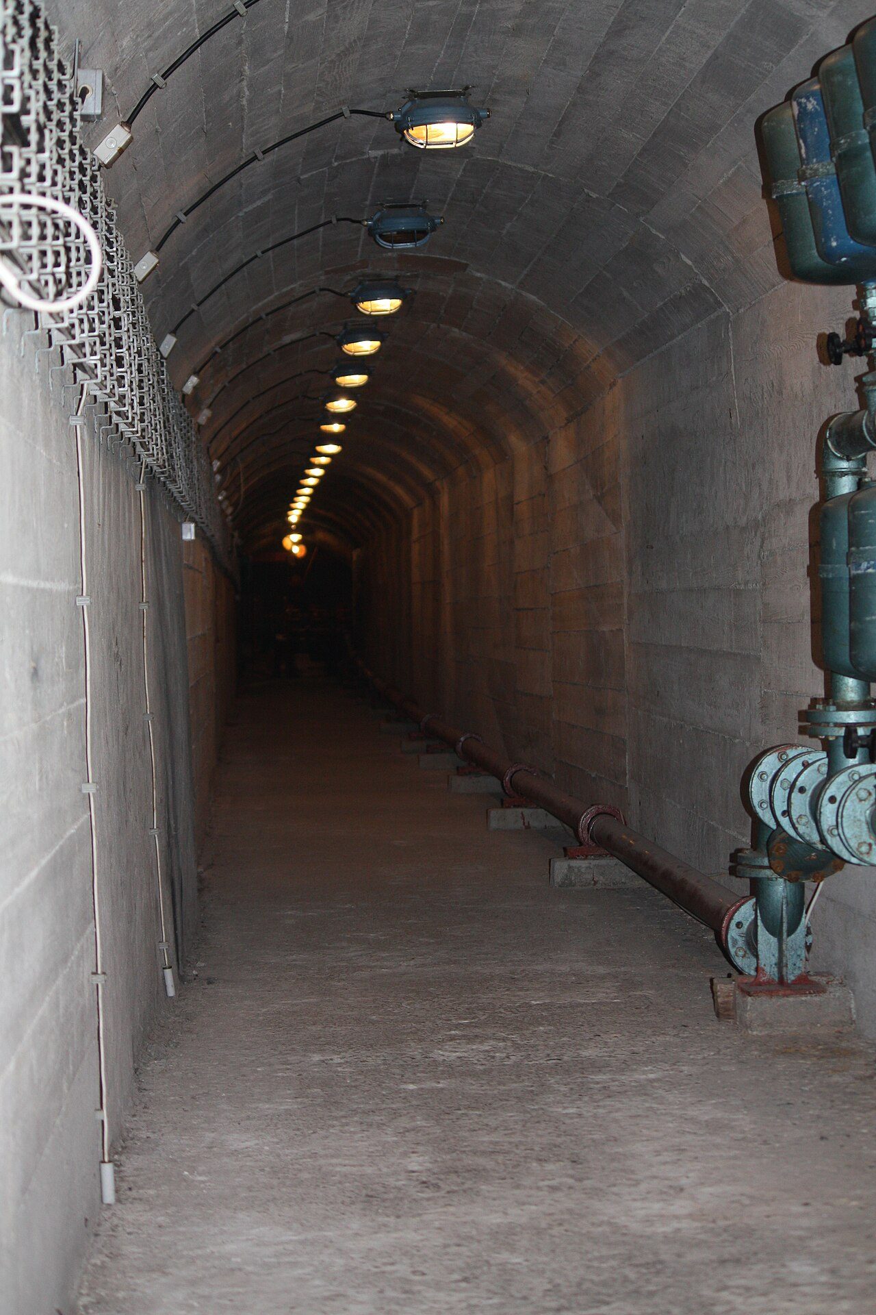 A long, lit concrete corridor inside Tito's bunker, ARK D-0, near Konjic