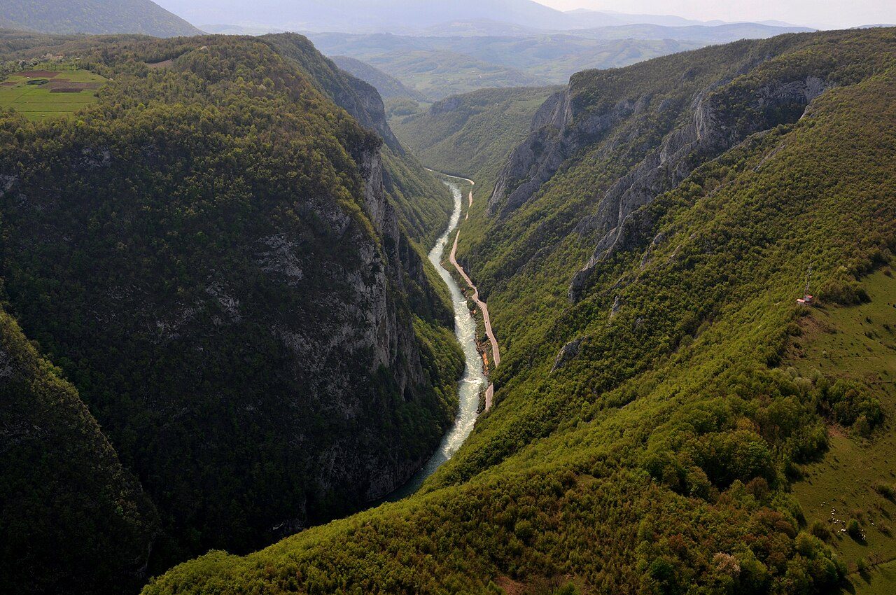 The Vrbas river winding through the deep, green Tijesno canyon